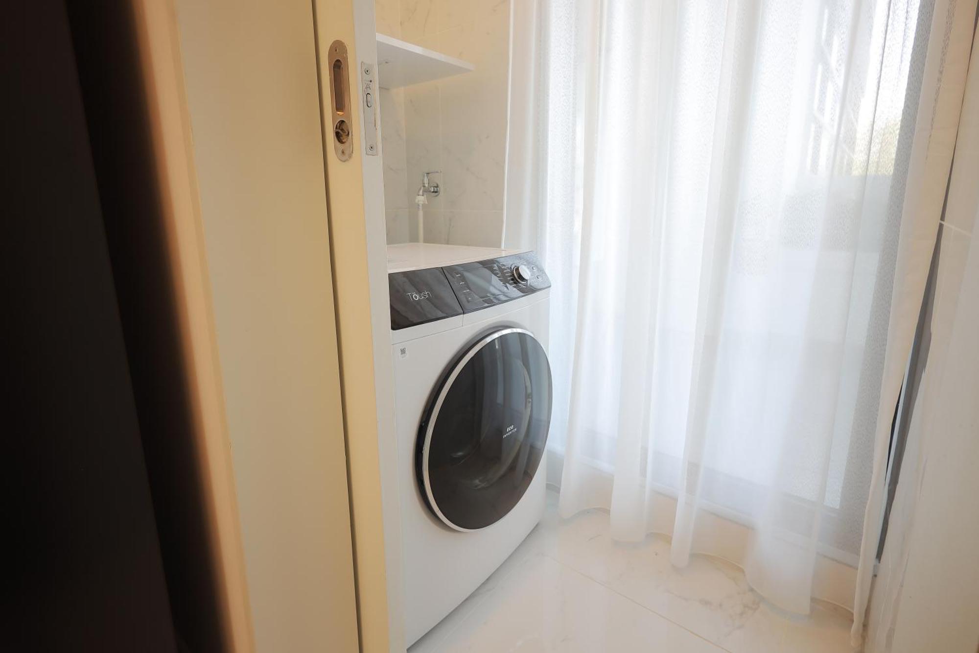 The Riyaz Lavanya Langkawi Pantai Cenang  Extérieur photo A washing machine